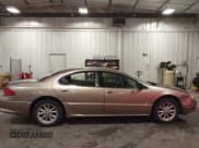 ✅ 2000 Chrysler LHS • VIN: 2C3HC56G9YH327598 • Lot: 42721520. Listed on IAAI with 141,235 mi. Free auction sales archive from the USA and detailed vehicle history report at DreamBid. Image 14.