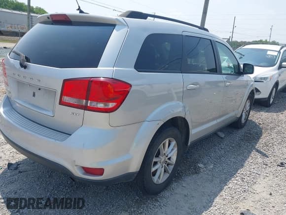 ✅ 2014 Dodge Journey SXT • VIN: 3C4PDCBB0ET133029 • Lot: 42434575. Listed on IAAI with 218,609 mi. Free auction sales archive from the USA and detailed vehicle history report at DreamBid. Image 4.