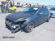 ✅ 2014 Mazda 3 i Sport • VIN: JM1BM1K75E1204517 • Lot: 42569990. Listed on IAAI with 98,502 mi. Free auction sales archive from the USA and detailed vehicle history report at DreamBid. Image 2.