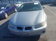✅ 2000 Pontiac Grand Prix GTP • VIN: 1G2WR1217YF175046 • Лот: 40203307. Опубликован ранее на IAAI с пробегом 234 063 миль. Бесплатный доступ к архиву аукционных продаж из США и подробный отчёт об истории автомобиля на DreamBid. Изображение 6.