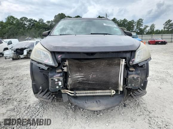 ✅ 2017 Chevrolet Traverse LS • VIN: 1GNKRFED3HJ267112 • Lot: 70893585. Wystawiony na Copart z przebiegiem 120 631 mil. Bezpłatny archiwum sprzedaży aukcyjnych z USA i szczegółowy raport historii pojazdu na DreamBid. Zdjęcie 5.