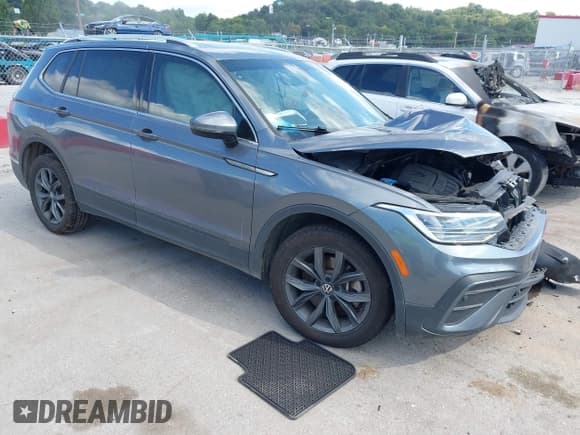 ✅ 2022 Volkswagen Tiguan SE • VIN: 3VV2B7AX7NM125459 • Лот: 43043601. Опубликован ранее на IAAI с пробегом 58 638 миль. Бесплатный доступ к архиву аукционных продаж из США и подробный отчёт об истории автомобиля на DreamBid. Изображение 1.