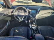 ✅ 2013 Hyundai Veloster w/Black Int • VIN: KMHTC6AD4DU101528 • Lot: 87218585. Wystawiony na Copart z przebiegiem 126 558 mil. Bezpłatny archiwum sprzedaży aukcyjnych z USA i szczegółowy raport historii pojazdu na DreamBid. Zdjęcie 8.