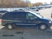 ✅ 2006 Chrysler Town & Country Touring • VIN: 2A4GP54LX6R775541 • Lot: 43573316. Listed on IAAI with 128,490 mi. Free auction sales archive from the USA and detailed vehicle history report at DreamBid. Image 13.