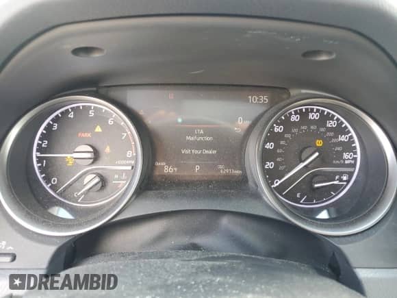 2021 Toyota Camry SE с VIN 4T1T11BK1MU026292, выставлен на аукционе Copart как лот 69388335 с пробегом 62 913 миль миль и Списание • Salvage title. История ставок и продаж доступна на DreamBid. Изображение 9.