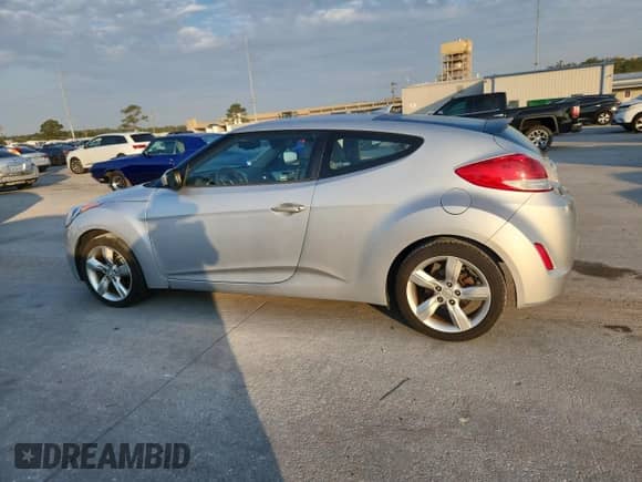 2012 Hyundai Veloster w/Gray Int с VIN KMHTC6AD3CU020065, выставлен на аукционе Copart как лот 80550225 с пробегом 249 792 миль миль и Чистый • Clean title. История ставок и продаж доступна на DreamBid. Изображение 2.