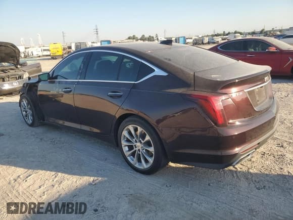 ✅ 2021 Cadillac CT5 Premium Luxury • VIN: 1G6DN5RK9M0115886 • Лот: 86822555. Опубликован ранее на Copart с пробегом 42 058 миль. Бесплатный доступ к архиву аукционных продаж из США и подробный отчёт об истории автомобиля на DreamBid. Изображение 2.