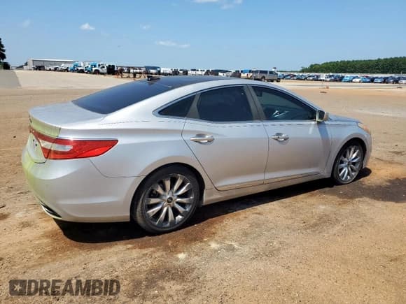 ✅ 2012 Hyundai Azera • VIN: KMHFH4JG7CA192212 • Лот: 65570545. Опубликован ранее на Copart с пробегом 120 705 миль. Бесплатный доступ к архиву аукционных продаж из США и подробный отчёт об истории автомобиля на DreamBid. Изображение 3.