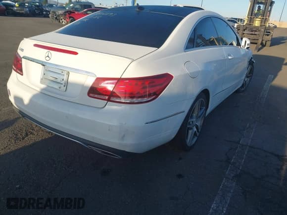 ✅ 2015 Mercedes-Benz E 400 • VIN: WDDKJ6FB3FF303383 • Lot: 41818692. Listed on IAAI with 62,839 mi. Free auction sales archive from the USA and detailed vehicle history report at DreamBid. Image 4.