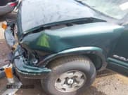 ✅ 2004 Chevrolet Blazer LS • VIN: 1GNDT13X24K107558 • Lot: 42124715. Wystawiony na IAAI z przebiegiem 80 843 mil. Bezpłatny archiwum sprzedaży aukcyjnych z USA i szczegółowy raport historii pojazdu na DreamBid. Zdjęcie 6.