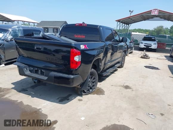✅ 2021 Toyota Tundra SR5 • VIN: 5TFEY5F17MX285935 • Lot: 42458911. Listed on IAAI with 74,125 mi. Free auction sales archive from the USA and detailed vehicle history report at DreamBid. Image 4.