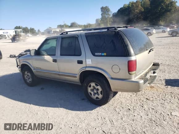 2004 Chevrolet Blazer LS z VIN 1GNDT13X64K162188, wystawiony jako Copart lot #74063354 z przebiegiem Nie podano mil oraz Szkoda całkowita • Salvage title. Historia ofert i sprzedaży dostępna na DreamBid. Obrazek 2.