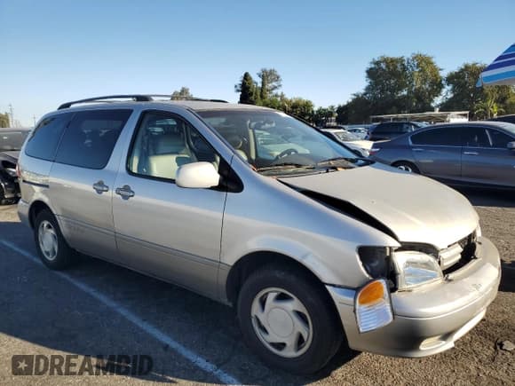 ✅ 2002 Toyota Sienna LE • VIN: 4T3ZF13C52U505287 • Lot: 77164884. Listed on Copart with Not provided. Free auction sales archive from the USA and detailed vehicle history report at DreamBid. Image 4.