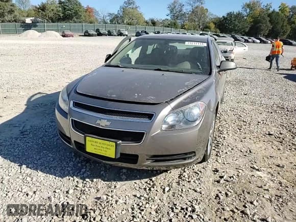 ✅ 2012 Chevrolet Malibu 1LS • VIN: 1G1ZB5E03CF260278 • Lot: 77217114. Listed on Copart with 148,952 mi. Free auction sales archive from the USA and detailed vehicle history report at DreamBid. Image 11.