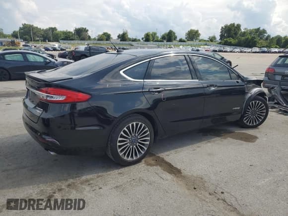 ✅ 2018 Ford Fusion Titanium • VIN: 3FA6P0RU2JR226253 • Lot: 68665825. Wystawiony na Copart z przebiegiem 99 190 mil. Bezpłatny archiwum sprzedaży aukcyjnych z USA i szczegółowy raport historii pojazdu na DreamBid. Zdjęcie 3.