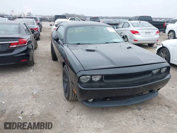 2014 Dodge Challenger R/T 100th Anniversary Appearance with VIN 2C3CDYBT6EH242063, listed as a IAAI auction lot 41490675 with 143,802 mi miles and . Bid and sale history available at DreamBid. Image 1.