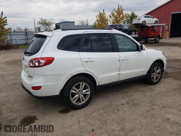 ✅ 2010 Hyundai Santa Fe • VIN: 5NMSG4AG2AH402529 • Лот: 91291095. Опубликован ранее на Copart с пробегом 269 428 миль. Бесплатный доступ к архиву аукционных продаж из США и подробный отчёт об истории автомобиля на DreamBid. Изображение 3.