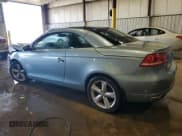 ✅ 2012 Volkswagen Eos Executive • VIN: WVWFW7AH4CV000600 • Lot: 63389795. Listed on Copart with 120,200 mi. Free auction sales archive from the USA and detailed vehicle history report at DreamBid. Image 2.