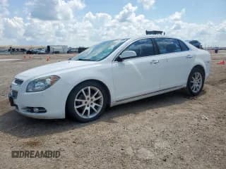 ✅ 2012 Chevrolet Malibu LTZ • VIN: 1G1ZG5E72CF286630 • Lot: 71409355. Listed on Copart with 124,448 mi. Free auction sales archive from the USA and detailed vehicle history report at DreamBid. Image 1.