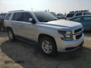 ✅ 2018 Chevrolet Tahoe LT • VIN: 1GNSCBKC5JR371405 • Lot: 82742255. Listed on Copart with 106,269 mi. Free auction sales archive from the USA and detailed vehicle history report at DreamBid. Image 4.