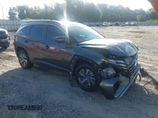 2022 Hyundai Tucson Blue z VIN KM8JBCA15NU038973, wystawiony jako IAAI lot #42525559 z przebiegiem 62 752 mil mil oraz . Historia ofert i sprzedaży dostępna na DreamBid. Obrazek 1.