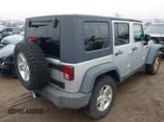 ✅ 2008 Jeep Wrangler Unlimited Rubicon • VIN: 1J4GA69118L616014 • Лот: 43740634. Опубликован ранее на IAAI с пробегом 144 936 миль. Бесплатный доступ к архиву аукционных продаж из США и подробный отчёт об истории автомобиля на DreamBid. Изображение 4.