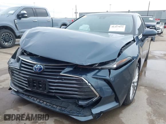 ✅ 2022 Toyota Avalon Limited Hybrid • VIN: 4T1DA1AB2NU013574 • Lot: 41357973. Wystawiony na IAAI z przebiegiem 24 475 mil. Bezpłatny archiwum sprzedaży aukcyjnych z USA i szczegółowy raport historii pojazdu na DreamBid. Zdjęcie 6.
