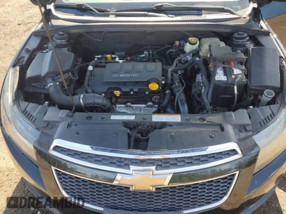 2012 Chevrolet Cruze ECO z VIN 1G1PJ5SC6C7239041, wystawiony jako Copart lot #83823125 z przebiegiem 159 410 mil mil oraz Szkoda całkowita • Salvage title. Historia ofert i sprzedaży dostępna na DreamBid. Obrazek 11.