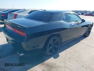 ✅ 2009 Dodge Challenger SRT-8 • VIN: 2B3LJ74W09H579485 • Lot: 41249822. Wystawiony na IAAI z przebiegiem 110 954 mil. Bezpłatny archiwum sprzedaży aukcyjnych z USA i szczegółowy raport historii pojazdu na DreamBid. Zdjęcie 4.