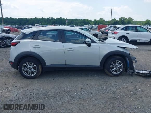 ✅ 2021 Mazda CX-3 Sport • VIN: JM1DKDB75M1503455 • Лот: 42571495. Опубликован ранее на IAAI с пробегом 49 381 миль. Бесплатный доступ к архиву аукционных продаж из США и подробный отчёт об истории автомобиля на DreamBid. Изображение 14.