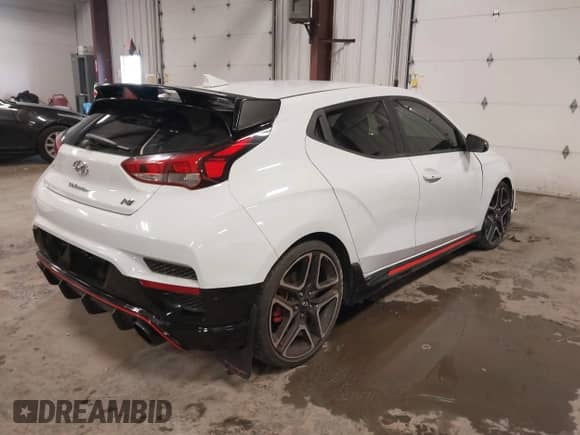 2020 Hyundai Veloster z VIN KMHT36AHXLU007297, wystawiony jako IAAI lot #41557520 z przebiegiem 42 934 mil mil oraz . Historia ofert i sprzedaży dostępna na DreamBid. Obrazek 4.