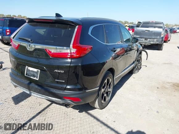 ✅ 2018 Honda CR-V Touring • VIN: 2HKRW2H96JH601132 • Lot: 43687985. Wystawiony na IAAI z przebiegiem 74 062 mil. Bezpłatny archiwum sprzedaży aukcyjnych z USA i szczegółowy raport historii pojazdu na DreamBid. Zdjęcie 4.