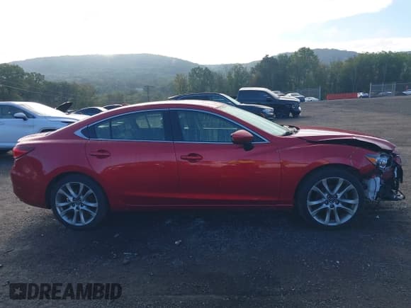 ✅ 2015 Mazda 6 i Grand Touring • VIN: JM1GJ1W64F1168143 • Лот: 43219328. Опубликован ранее на IAAI с пробегом 155 075 миль. Бесплатный доступ к архиву аукционных продаж из США и подробный отчёт об истории автомобиля на DreamBid. Изображение 14.