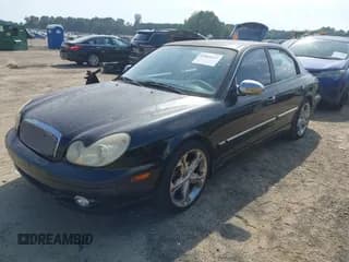 ✅ 2002 Hyundai Sonata GLS • VIN: KMHWF35HX2A557404 • Lot: 42869421. Listed on IAAI with 242,947 mi. Free auction sales archive from the USA and detailed vehicle history report at DreamBid. Image 2.