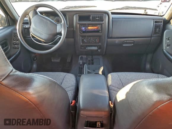 ✅ 2001 Jeep Cherokee Sport • VIN: 1J4FF48S51L596481 • Lot: 94193505. Listed on Copart with 127,415 mi. Free auction sales archive from the USA and detailed vehicle history report at DreamBid. Image 8.