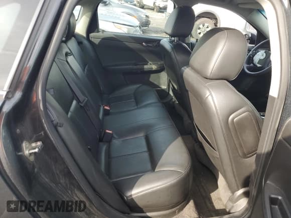 ✅ 2016 Chevrolet Impala LTZ • VIN: 2G1WC5E38G1180739 • Лот: 85198835. Опубликован ранее на Copart с пробегом 125 642 миль. Бесплатный доступ к архиву аукционных продаж из США и подробный отчёт об истории автомобиля на DreamBid. Изображение 10.