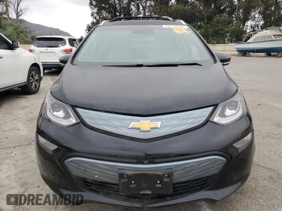 ✅ 2017 Chevrolet Bolt EV Premier • VIN: 1G1FX6S03H4147464 • Lot: 76112294. Wystawiony na Copart z przebiegiem Nie podano. Bezpłatny archiwum sprzedaży aukcyjnych z USA i szczegółowy raport historii pojazdu na DreamBid. Zdjęcie 5.
