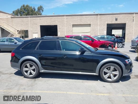 ✅ 2016 Audi allroad A4 Premium • VIN: WA1TFAFL2GA016332 • Lot: 42660655. Listed on IAAI with 49,246 mi. Free auction sales archive from the USA and detailed vehicle history report at DreamBid. Image 13.
