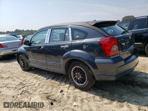 2007 Dodge Caliber z VIN 1B3HB28B07D384736, wystawiony jako Copart lot #73185764 z przebiegiem 259 438 mil mil oraz Nie do naprawy • Non repairable. Historia ofert i sprzedaży dostępna na DreamBid. Obrazek 2.
