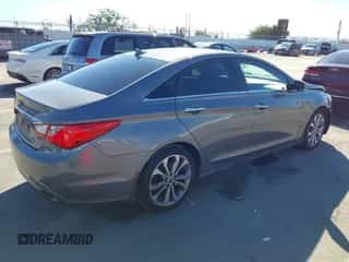2013 Hyundai Sonata SE with VIN 5NPEC4AB7DH621765, listed as a IAAI auction lot 43450475 with 127,708 mi miles and . Bid and sale history available at DreamBid. Image 4.