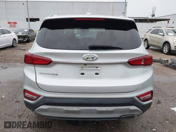 2019 Hyundai Santa Fe SEL Plus z VIN 5NMS33AD3KH130800, wystawiony jako IAAI lot #42666362 z przebiegiem 102 952 mil mil oraz . Historia ofert i sprzedaży dostępna na DreamBid. Obrazek 16.