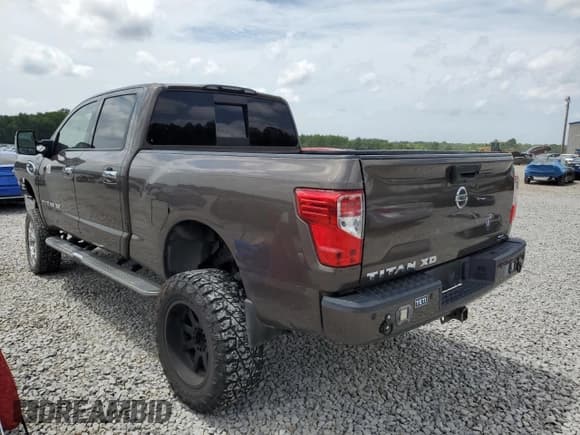 ✅ 2017 Nissan Titan SL • VIN: 1N6BA1F27HN547900 • Лот: 61768145. Опубликован ранее на Copart с пробегом 148 383 миль. Бесплатный доступ к архиву аукционных продаж из США и подробный отчёт об истории автомобиля на DreamBid. Изображение 2.