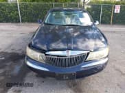 ✅ 2001 Lincoln Continental • VIN: 1LNHM97V41Y614240 • Lot: 42937135. Listed on IAAI with 67,882 mi. Free auction sales archive from the USA and detailed vehicle history report at DreamBid. Image 6.