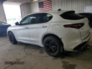 ✅ 2018 Alfa Romeo Stelvio • VIN: ZASFAKEV2J7C03902 • Lot: 59962645. Listed on Copart with 110,676 mi. Free auction sales archive from the USA and detailed vehicle history report at DreamBid. Image 2.