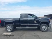 ✅ 2015 GMC Sierra 2500HD SLT • VIN: 1GT22ZEG5FZ144077 • Lot: 43268861. Wystawiony na IAAI z przebiegiem 171 426 mil. Bezpłatny archiwum sprzedaży aukcyjnych z USA i szczegółowy raport historii pojazdu na DreamBid. Zdjęcie 13.
