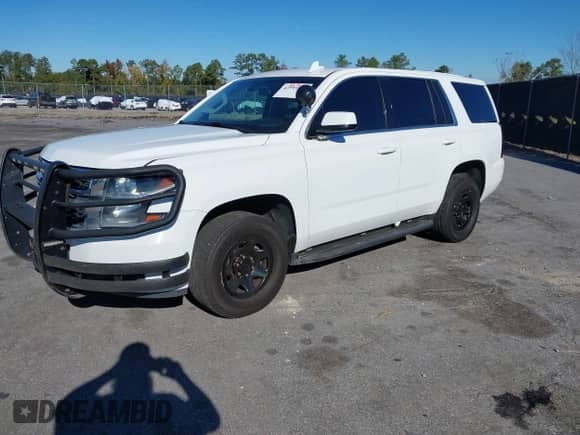 2018 Chevrolet Tahoe with VIN 1GNLCDKC7JR369185, listed as a IAAI auction lot 43595849 with 98,810 mi miles and . Bid and sale history available at DreamBid. Image 2.