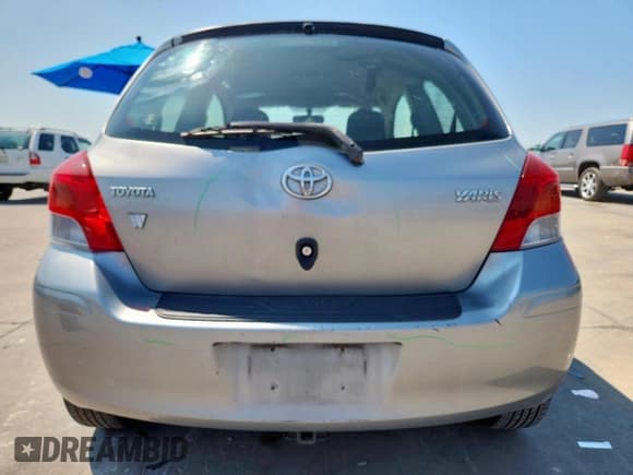 ✅ 2010 Toyota Yaris • VIN: JTDJT4K31A5324105 • Lot: 69291395. Listed on Copart with 180,729 mi. Free auction sales archive from the USA and detailed vehicle history report at DreamBid. Image 6.