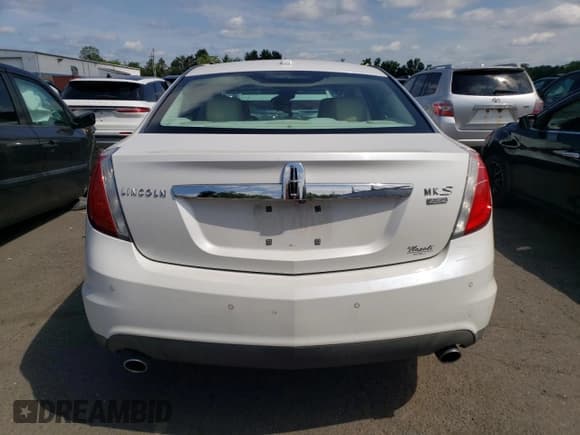 ✅ 2011 Lincoln MKS • VIN: 1LNHL9ER8BG608473 • Lot: 63197215. Listed on Copart with 66,535 mi. Free auction sales archive from the USA and detailed vehicle history report at DreamBid. Image 6.