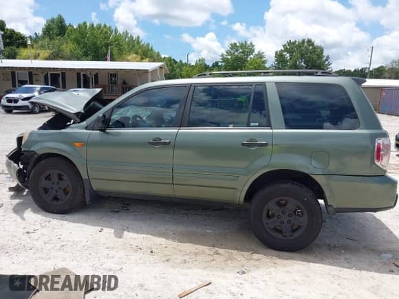 2007 Honda Pilot LX with VIN 5FNYF28167B023921, listed as a IAAI auction lot 42727822 with 177,088 mi miles and . Bid and sale history available at DreamBid. Image 14.
