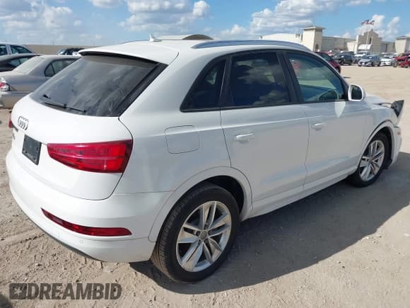 ✅ 2017 Audi Q3 Premium • VIN: WA1BCCFS0HR015321 • Lot: 43289182. Listed on IAAI with 108,590 mi. Free auction sales archive from the USA and detailed vehicle history report at DreamBid. Image 4.